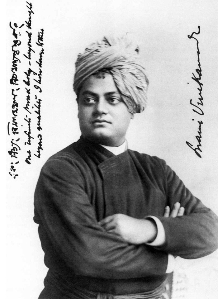 Swami Vivekananda photographed in Chicago in September 1893, arms folded, with his signature.