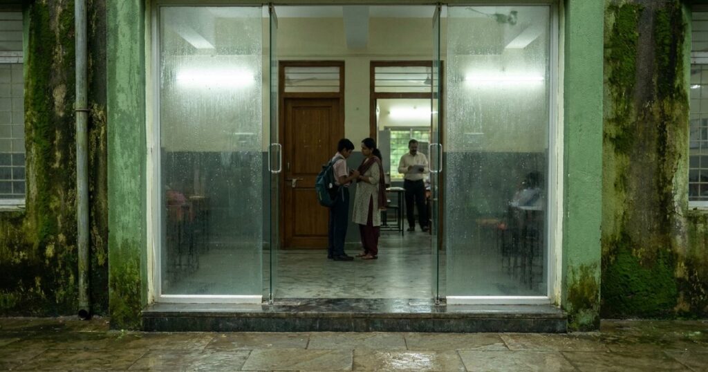 Parent and student outside an Indian coaching centre during Byju’s and Aakash uncertainty