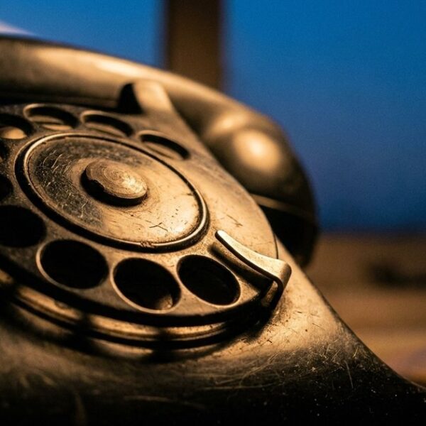 Close-up of a vintage rotary telephone emphasizing clear communication in sales to Indian buyers.
